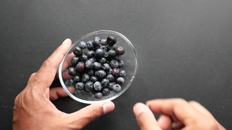 fresh blueberries in a glass bowl