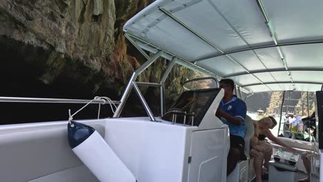 passengers experiencing a guided boat cave tour