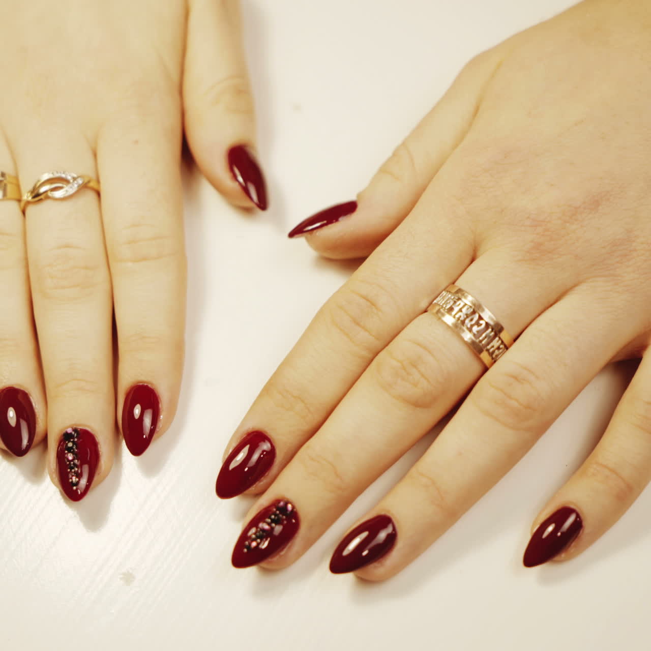 Elegant Red Nail Art with Rings