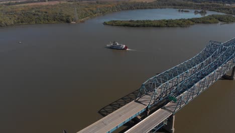 paddlewheel riverboat moves down the mighty illinois river near peoria, illinois, usa