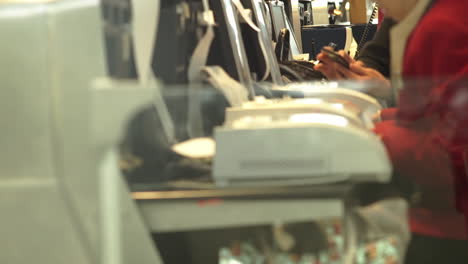 people working in a busy office environment with computers