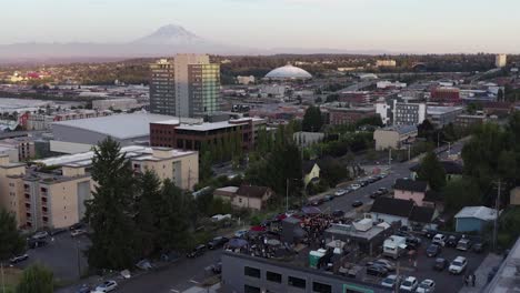 crowded people during rooftop concert on the cityscape of tacoma, washington in united states