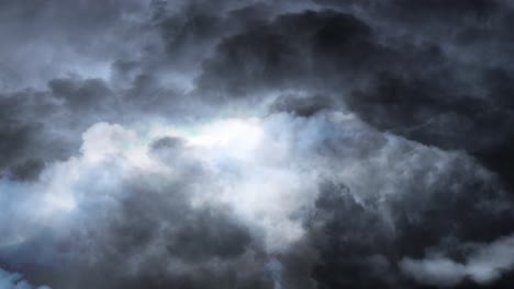 time-lapse lightning strike during a thunderstorm in black and dark clouds