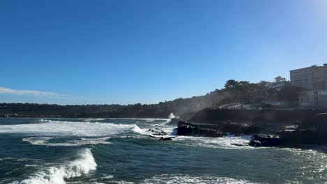 4K-slow-motion-footage-of-large-ocean-waves-crashing-on-cliffs-during-high-tide-in-La-Jolla-Cove,-San-Diego-California