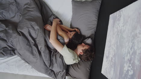 couple sleeping in bed