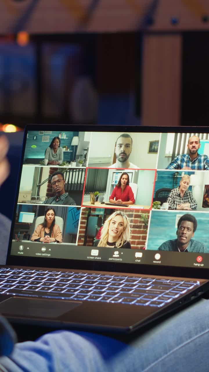 Vertical Video Smiling african american man hosting a virtual family meeting online