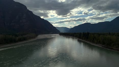 Aerial-Vista-of-the-Mighty-Fraser-River-near-Hope,-BC,-Amid-Iconic-Timbered-Mountains