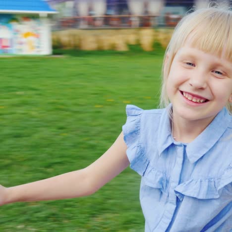 pov - little girl is riding on a swing 2