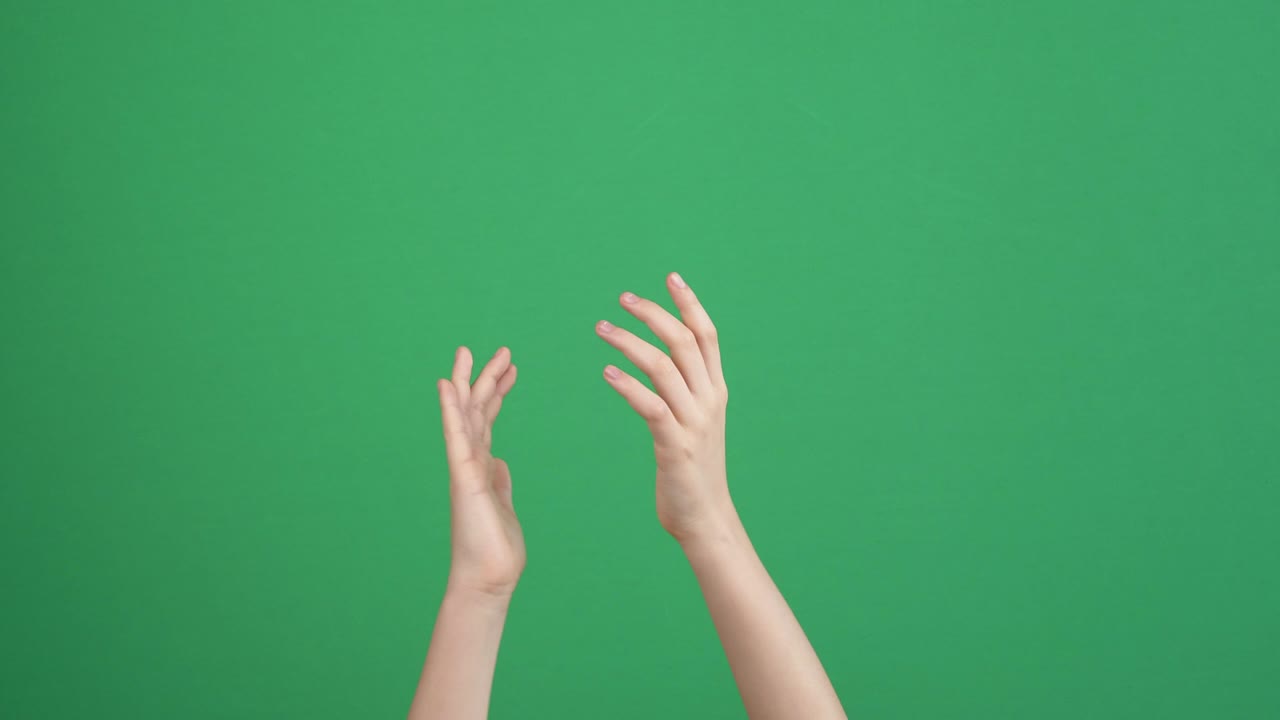 Kid clapping hands, applauding and show gesturing thumbs up on green screen background