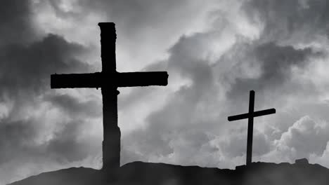 two graves on a silhouetted mountain