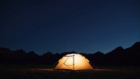 camping tent under night sky