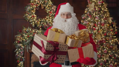 santa claus with christmas presents