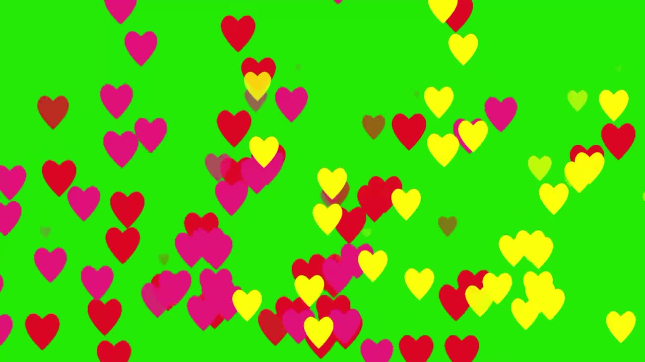 노란색, 빨간색, 분홍색의 심장 기호가 녹색 화면에 비방울처럼 떨어집니다.