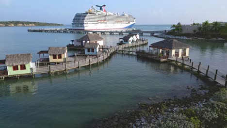 ocean villas of resort in amber cove with cruise ship in background, puerto plata in dominican republic