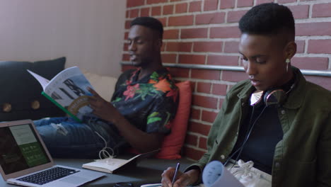 african-american-business-students-working-together-on-project-beauitful-african-american-woman-using-laptop-technology-in-trendy-office-workplace