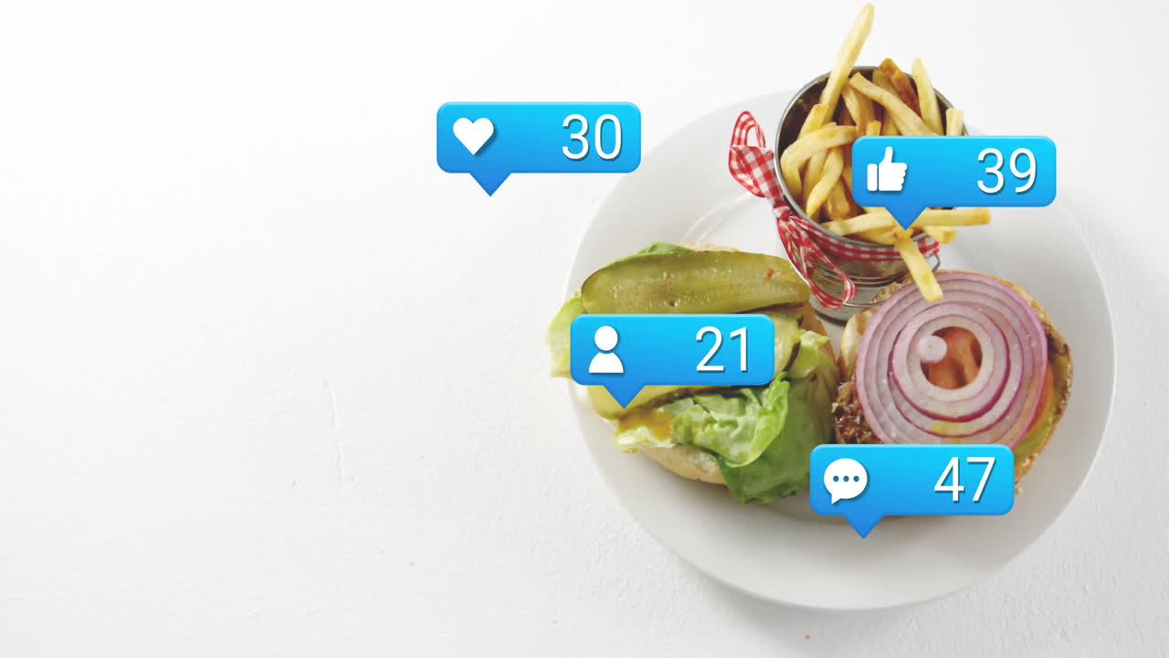 On plate, burger and fries with animation of social media notification icons