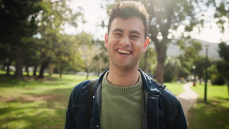 portrait of a smiling man in a park