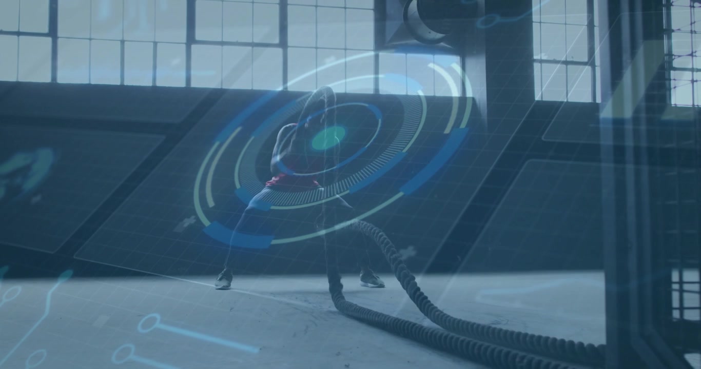 Man gripping ropes starting fitness training, making waves and slams as holo torso overlay pulsing