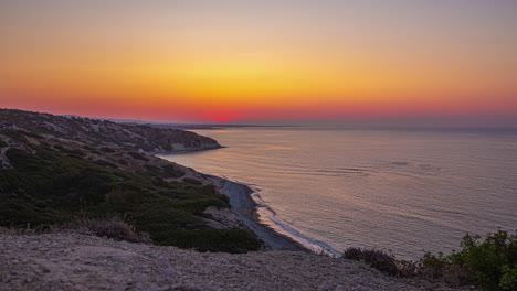timelapse of a sunrise at the bay from a viewpoint with pastel colors in the sky