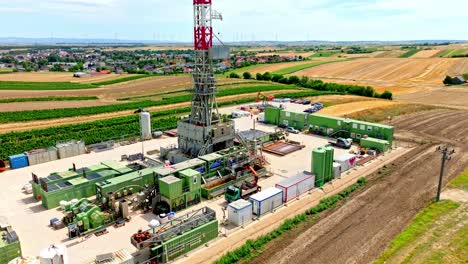 drilling rig for oil and gas in austria - aerial drone shot