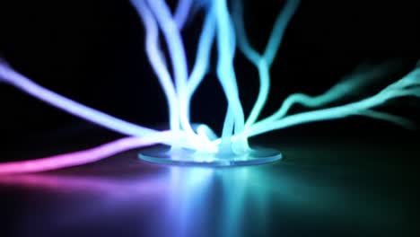 captivating visual of electric light tendrils emanating from a central point, creating a dynamic display of colorful waves and luminescence in a dark setting