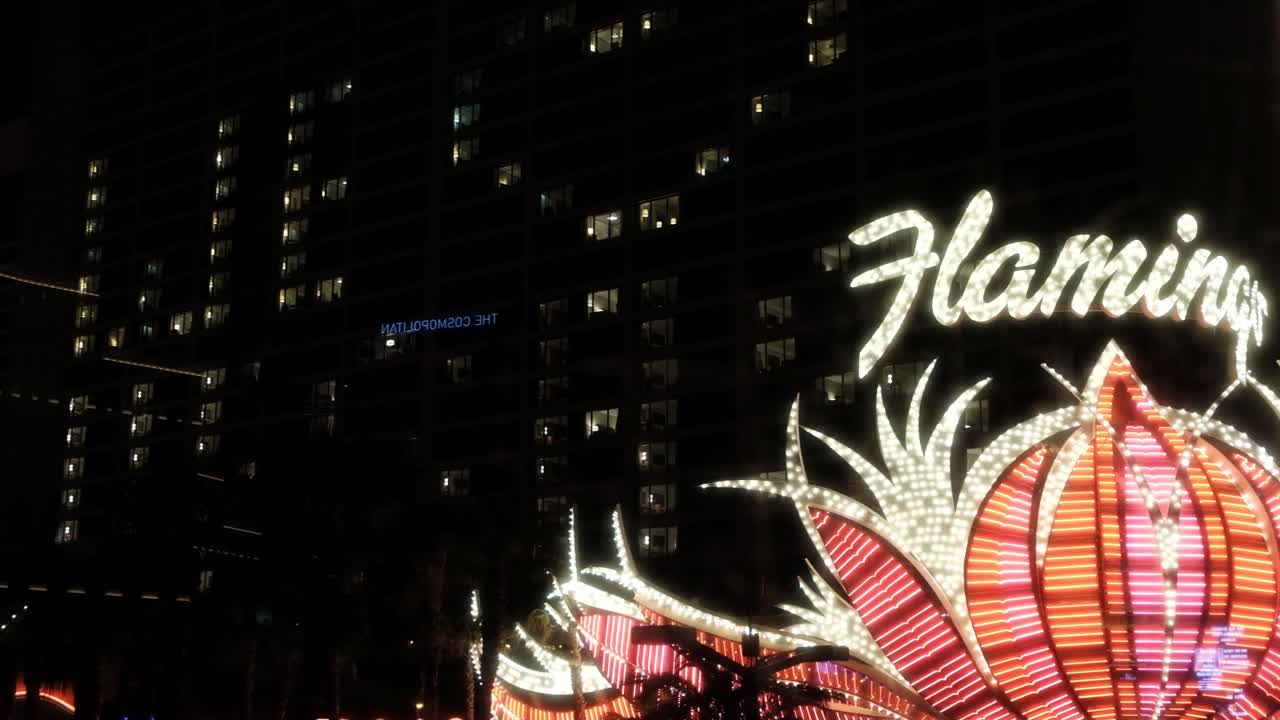 Flamingo, Las Vegas, Nevada USA. Shiny Neon Logo Close Up of Hotel - Casino at Night