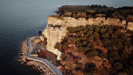 View-of-a-wall-and-a-castle-on-the-greek-shore-next-to-the-Mediterranean-sea