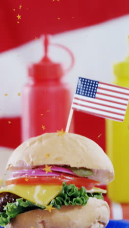 animation of dust floating over burger and drinks over flag of usa