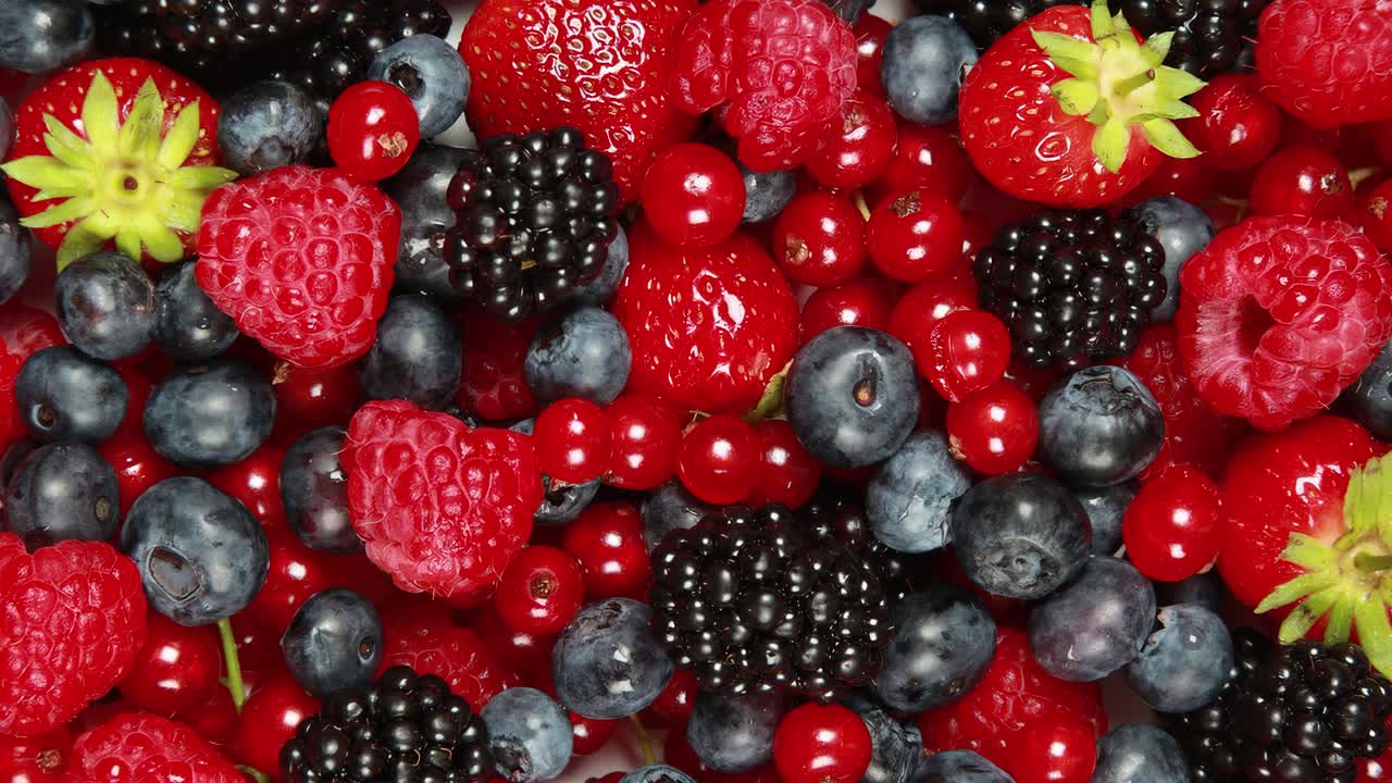 Blueberries, Red and Blue Raspberries. Fruit Background