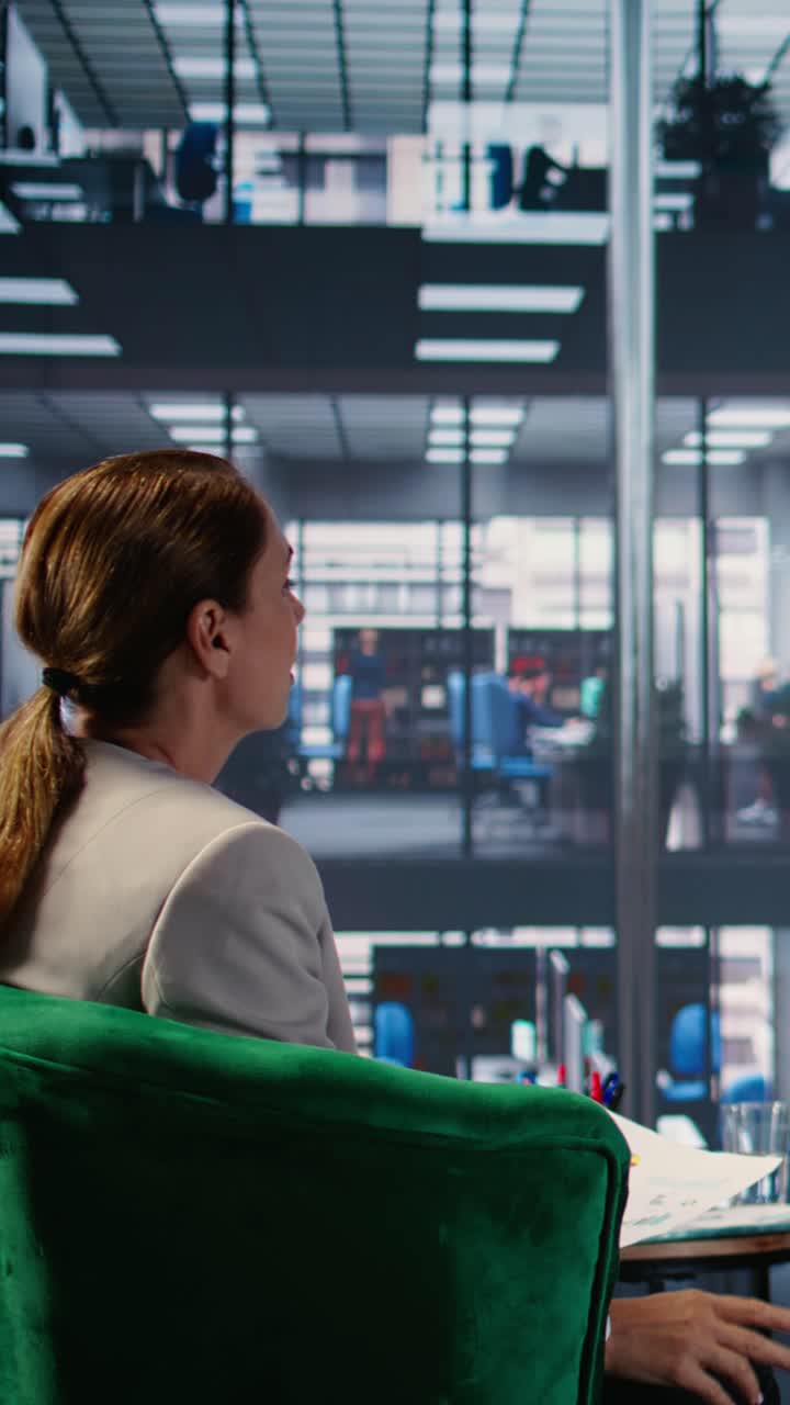 Vertical Video Business professionals in an office meeting for research and insights