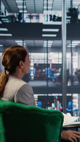 vertical video business professionals in an office meeting for research and insights