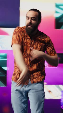 vertical video music influencer having fun dancing on beats for the party scene