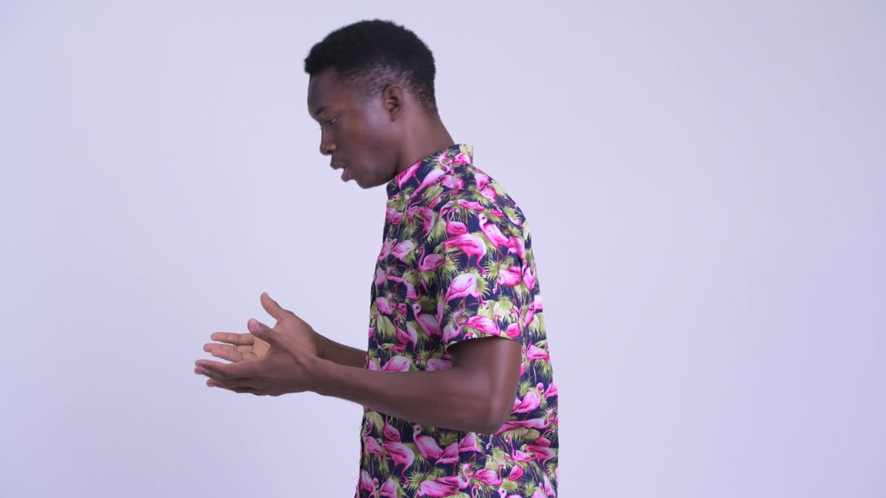 Young handsome African tourist man