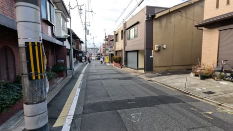 a car moves through a tranquil city street