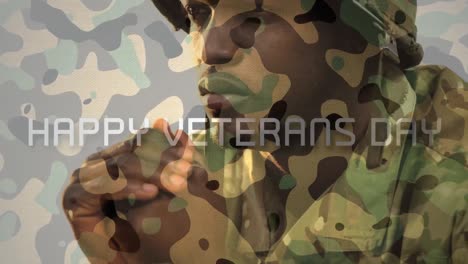 animación del feliz texto del día de los veteranos sobre un soldado pensativo en uniforme