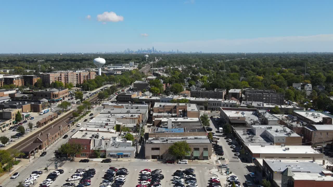 La Grange, IL on a sunny fall day, showcasing streets, buildings, and the suburban landscape With Downtown Chicago in Background. Dolly Forward Zoom x1 Day E