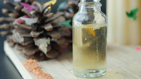 natural essential oil in a glass bottle