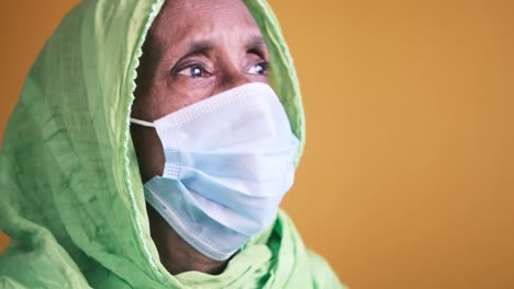 elderly woman wearing mask