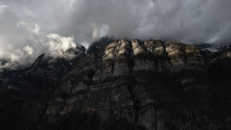 Low-Angle-Shot-Of-Rocky-Mountains-On-Walensee-Unterterzen-Lake-In-Switzerlan