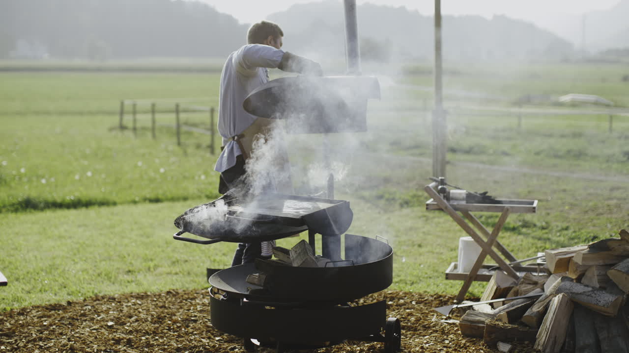Man Grilling Outdoors