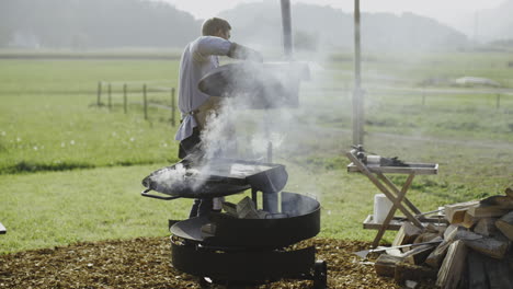 man grilling outdoors