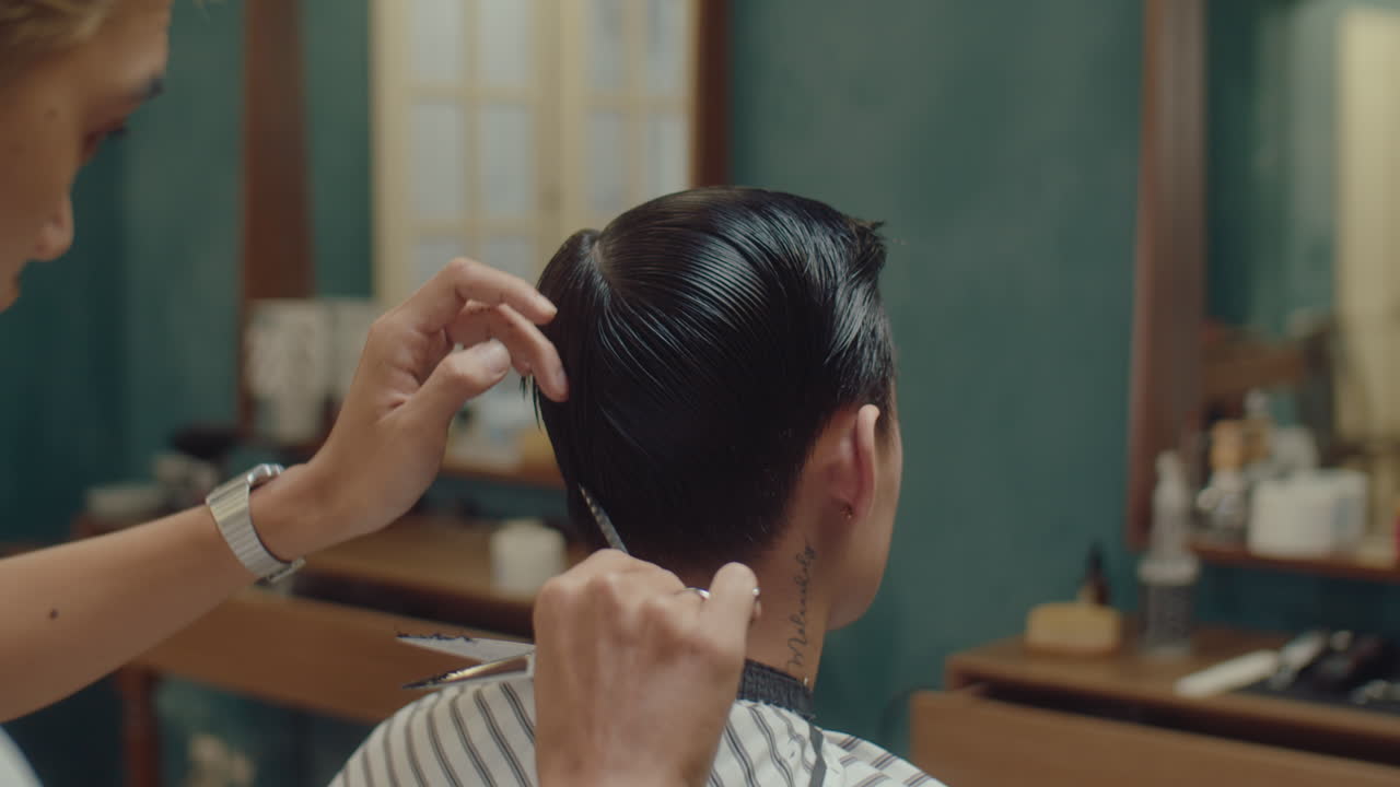 Barber Cutting Hair of a Client