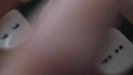 Extreme-close-up-on-caucasian-woman-hands-with-grey-nails-typing-on-typewriter