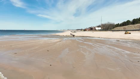 Low-height-shot-of-the-vast-expanse-of-beach-sand