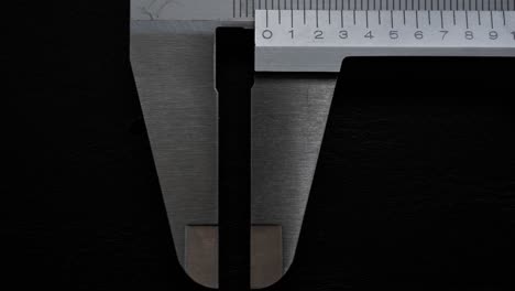 spread out for measurement and decrease. working vernier calipers.