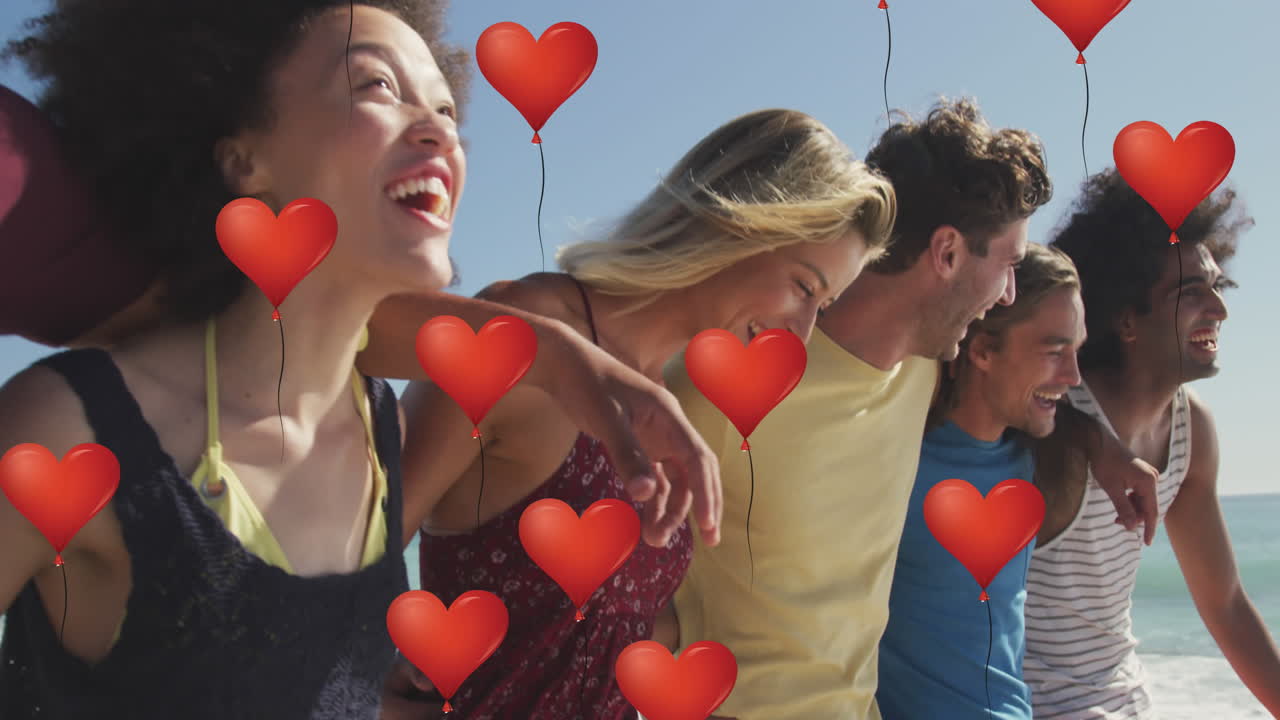 해변에서  ⁇ 고 웃는 친구들 위에 심장 아이콘의 애니메이션