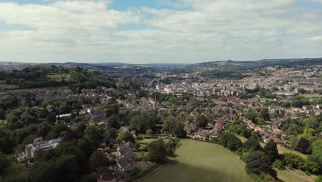 aerial, pan shot of city of bath from widcombe district across city, from south to north on a beautiful summers day