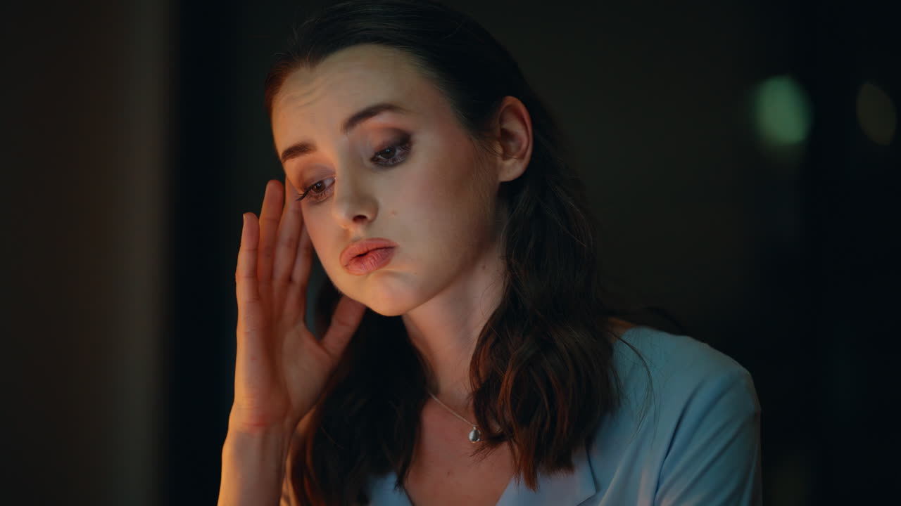 A portrait of a pensive and thoughtful woman