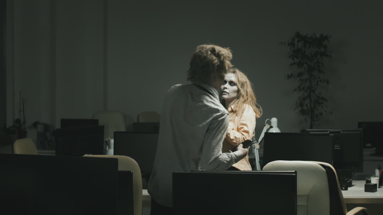 Zombie Colleagues with Mobile Phones in Office