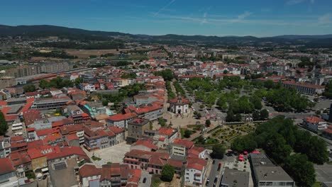 Aerial-view-of-Barcelos,-Portugal-featuring-Largo-da-Porta-Nova,-Senhor-Bom-Jesus-da-Cruz-church